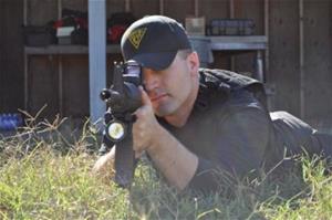 Officer Aiming Rifle